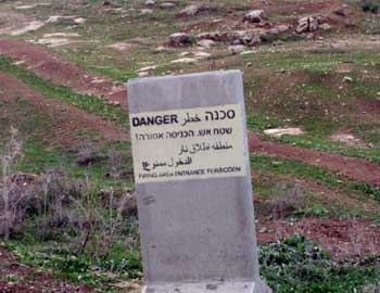 Sign posted by the army at the entrance to a Bedouin community, in the Jordan valley. Photo: Eyal Hareuveni, B’Tselem, 5 January 2010/