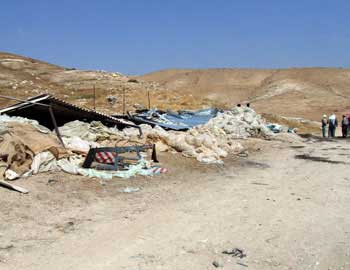 Huts demolished by the Civil Administration in al-Farsiya, in the Jordan Valley. Photo: Atef Abu a-Rub, B'Tselem, 19 July 2010.