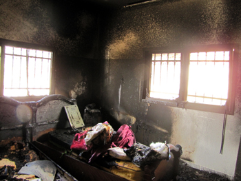 The burnt contents of a house torched in Huwara. Settlers are suspected of the act. Salma a-Deb'I, B'Tselem, 1 March '11