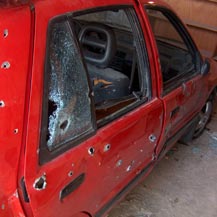 The car that held three of the four Palestinians killed by security forces in Bethlehem. Photo: Suha Zeid, 13 March 2008.