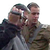 Army officer denies his duty to protect Palestinians in the Occupied Territories, 15 Dec. '09, Deir Nidham