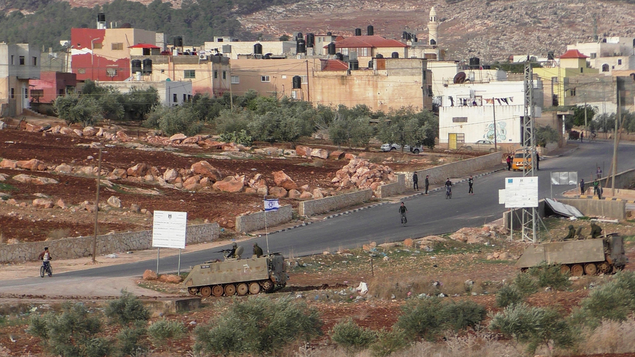 Soldiers train next to the village of al-'Aqabah. Photo by: ‘Aref Daraghmeh, 5 Feb. 2018