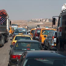 Palestinian vehicles delayed at the Jaba' checkpoint, on their way into Ramallah. Photo: Kareem Jubran, B'Tselem.