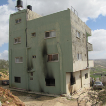 	  	

A house torched in Huwara. Settlers are suspected of the act. Photo: Salma a-Deb'I, B'Tselem, 1 March 2011.