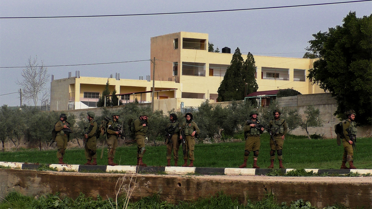 Military training near al-'Aqabah. Photo by: ‘Aref Daraghmeh, 15 Feb. 2018