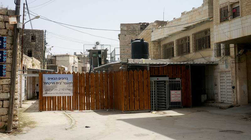 The reinforced Pharmacy Checkpoint. It separates the neighborhood of a-Sahla from the southern neighborhoods of Hebron in Areas H1 and H2.