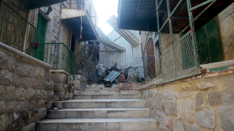 Barrier between a closed Palestinian market and the settlement of Beit Romano, near the Shalalot area.