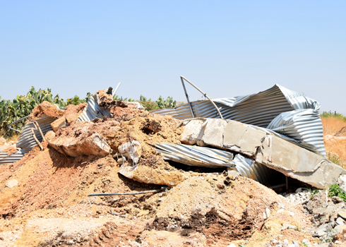 חורבות הבריכה החקלאית בברדלה מראח. צילום: עארף דר'ארמה, בצלם, 12.7.21
