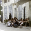 <p>[1317] 11  Israeli soldiers guard Palestinians they have arrested after entering Qalqilya, as part of Operation Defensive Shield, March 2002.</p><p>Photo credit: Omar Qusini, © Reuters</p>