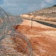 <p>[1060] 1.10.0 مقطع من الجدار الفاصل قرب بلدة جيوس</p><p>تصوير: يحزكيل لاين, بتسيلم</p>