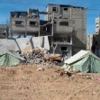 <p>[1744] 1  Houses demolished in the Rafah refugee camp, in the Gaza Strip, November 2003.</p><p>Photo credit: Mazen Al Majdalawy, B'Tselem</p>