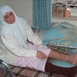 <p>[5346] 1  A Palestinian woman who was seriously injured while crossing the roadblock at Halhoul when a big rock fell on her and broke her leg.  The woman is a cancer patient and was on the way home from the hospital.</p><p>Photo credit: Musa Abu Hashhash, B'Tselem</p>
