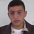 <p>[4839] 8  Muhammad 'Attawneh after being beaten by Border Police officers who broke into a building in Jerusalem in which he and four other Palestinians from Kharas were staying while they worked in the city.</p><p>Photo credit: Musa Abu Hashhash, B'Tselem</p>
