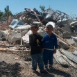 <p>[4554] 2  Two children stand in front of their recently demolished house in Beit Hanina in Jerusalem.</p><p>Photo credit: Eliezer Moav, B'Tselem</p>