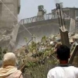 <p>[4420] 14  Palestinians watch a house demolition in Rafah.</p><p>Photo credit: Laszlo Balogh</p>