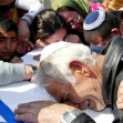 <p>[6963] 27  The funeral of Yitzhak Buzaglo, who was killed in a suicide bombing in Israel.</p><p>Photo credit: Haim Azoulay, © Reuters</p>