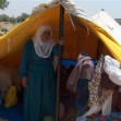 <p>[6909] 18  Hakmeh al-Muher, 68, from Ti’anik, Jenin District, lives in a tent she received from the Red Cross after the Civil Administration, despite a temporary stay of execution ordered by the court, destroyed her shack, claiming it was built without a permit.</p><p>Photo credit: Atef Abu A-Rob, B'Tselem</p>