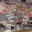 <p>[7094] 5  Demolition of the Abu Sneineh's house in a-Tur, in East Jerusalem, for being built without a permit, 5 July 2005.</p><p>Photo credit: Kareem Jubran, B'Tselem</p>
