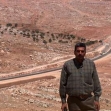 <p>[7278] 11  Mwafek al-Khatib, at the separation barrier near Hizma. The barrier Khatib's flock of sheep from its pasture land.</p><p>Photo credit: Kareem Jubran, B'Tselem</p>