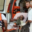 <p>[7137] 17 Au Israeli medics rush an injured Palestinian into Hadassah Hospital, Ein Kerem, in Jerusalem. The man was injured by a settler in the Shiloh settlement, who killed four Palestinian workers in the attack.</p><p>Photo credit: Haim Zach, © Reuters</p>