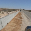 <p>[10594] 20  A cement barricade along Route 317 in the southern Hebron hills. The barricade was built to prevent the passage of sheep and Palestinian cars. 
20.2.06</p><p>Photo credit: Limor Yehuda, ACRI</p>