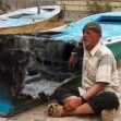 <p>[8550] 3  The fisherman Ibrahim al-Qur'an, whose boat was burnt after the navy fired at it while he was fishing, 21 April 2007.</p><p>Photo credit: Muhammad Sabah, B'Tselem</p>