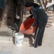 <p>[9106] 29  Resident of a-Dhahiriyah, Hebron District, saving water used in washing clothes to use for other purposes . Photo: Musa Abu Hashhash, B'Tselem., 29 October 2007</p><p>Photo credit: Musa Abu Hashhash, B'Tselem</p>