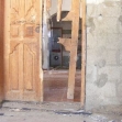 <p>[9556] 10  Door of the house of Wafa a-Daraghmeh, who was killed when soldiers blew up the door, 'Abasan al-Jadida, Khan Yunis, 7 May 2008.</p><p>Photo credit: Muhammad Sabah, B'Tselem</p>