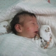 <p>[9889] 13  Narjes Nafe'a, a month and a half old, was injured when she inhaled tear gas that penetrated her house from grenades soldiers and Border Police threw into the yard of her house, Ni'lin, 13 July 2008.</p><p>Photo credit: Iyad Hadad, B'Tselem</p>