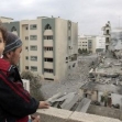 <p>[10227] 29  Operation Cast Lead: Palestinians looking at the ruins of a building at the Islamic University, in Gaza City, following an Israel Air Force strike, December 29, 2008. </p><p>Photo credit: Mohammad Salem, © Reuters</p>
