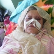 <p>[10325] 12  Operation Cast Lead: Intisar Hamuda was injured in a shelling of her house, in Gaza City, on 11 January 2009, in which two of her sons, Faris, 2, and Muhammad, 17, were killed.</p><p>Photo credit: Muhammad Sabah, B'Tselem</p>