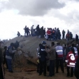 <p>[10347] 18 Jan Operation Cast Lead: Removal of bodies from the house of Wa'el a-Samuni, in Gaza City. where many were killed by army shelling after family members were told to gather there. Evacuation of the bodies was not allowed until 18 January.</p><p>Photo credit: Muhammad Sabah, B'Tselem</p>