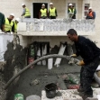 <p>[10642] 19  Workers seal the Abu Dahim family home. Photo: ‘Amar ‘Awad, Reuters, 19 Jan. ’09.</p><p>Photo credit: Ammar Awad, © Reuters</p>