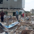 <p>[10378] 19  Operation Cast Lead: Due to shelling, the Shatiwi family was holed up in their home for 12 days. After they left, the army demolished the house, January 2009. Family members are seen next to the ruins of the family home.</p><p>Photo credit: Khaled 'Azayzeh, B'Tselem</p>
