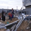 <p>[10416] 20  Operation Cast Lead: Family of 'Imad a-Samuni next to the ruins of their house, in the Zeitun neighborhhod of Gaza City. </p><p>Photo credit: Muhammad Sabah, B'Tselem</p>