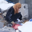 <p>[10417] 20  Operation Cast Lead: Daughter of 'Imad a-Samuni searching for her school materials under the ruins of her house.  </p><p>Photo credit: Muhammad Sabah, B'Tselem</p>