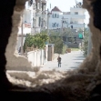 <p>[10342] 21 Jan Operation Cast Lead: A hole made by soldiers in the wall of a house in Khuza'a, southern Gaza Strip. On 13 January,soldiers fired through the hole at Rawheyeh a-Najar, who had left the house carrying a white flag, along with other persons</p><p>Photo credit: Khaled 'Azayzeh, B'Tselem</p>