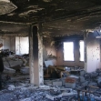 <p>[10606] 17 M Operation Cast Lead: An apartment in the house of the Zaqut family in Gaza City, which was burned as a result of shelling by the army on 13 January 2009. </p><p>Photo credit: Muhammad Sabah, B'Tselem</p>