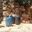 <p>[106] 1  A boy fills a bucket with water from a water tanker in the West Bank. During the summer, this is the primary source of water for residents of 150 Palestinian villages that are not connected to a water network.</p><p>Photo credit: Nisreen 'Alian, B'Tselem</p>