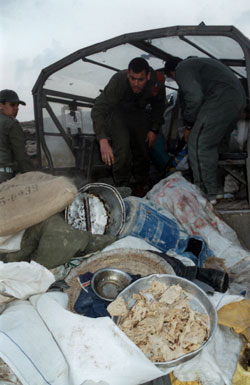 Eviction of Khirbet al-Mufaqarah residents, November 1999. The military loaded all their belongings on trucks and had it transported outside the firing zone. Photo: Nisreen 'Alian, B'Tselem