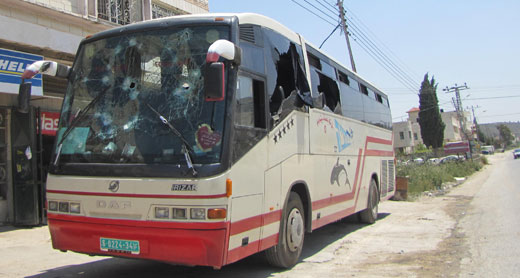 One of the buses attacked by settlers. Photo: Salma a-Deb'i, B'Tselem, 30 Apr. 2013