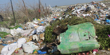 Beit Hanoun garbage dump and barbed wire fence &lsquo;Odeh Hamad was cutting when shot. Photo by Muhammad Sabah, B&rsquo;Tselem, 15 January 2014
