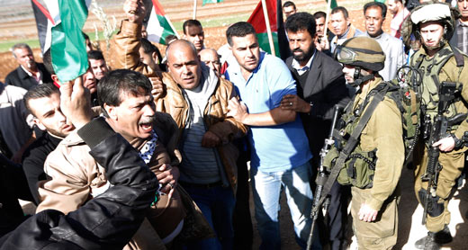 Palestinian Minister Ziad Abu Ein demonstrating today (10 Dec. 2014) at Turmusaya. Photo by Muhammad Torokman / Reuters