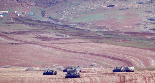 Military tanks in fields cultivated by the community, partially seen in the top-left corner. Photo by ‘Aref Daraghmeh, B'Tselem, 27 Jan. 2016