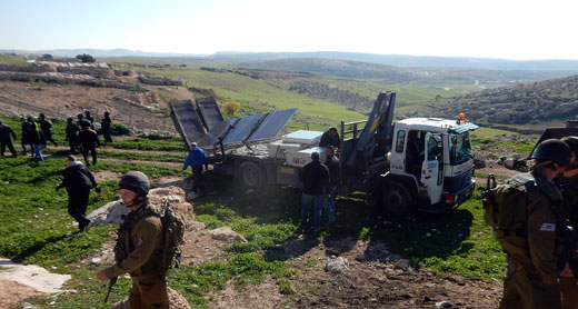 Confiscation of solar panels in Khirbet Jenbah. Photo: Nasser Nasser Nawaj'ah, B'Tselem, 2 Feb. 20166