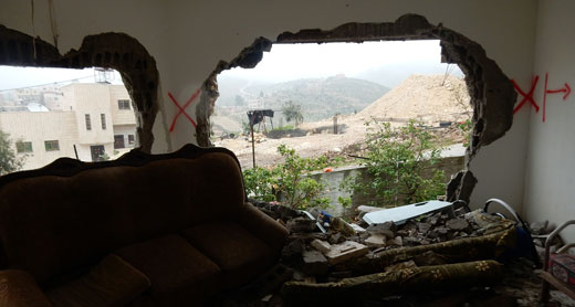 Al-Harub family home in Deir Samit after the demolition. Photo by Nasser Nawaj’ah, B’Tselem, 23 Feb. 2016