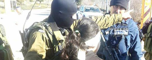 ד.ו. בשעת מעצרה. תמונה שהופצה ברשתות החברתיות על-ידי 