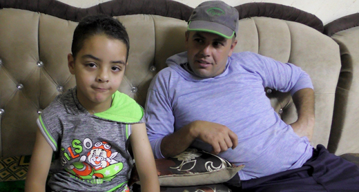 Hassan ‘Issa and his father, Ahmad ‘Issa, in their home. Photo by Manal al-Ja’bri, B’Tselem, 20 June 2017 Hassan ‘Issa and his father, Ahmad ‘Issa, in their home. Photo by Manal al-Ja’bri, B’Tselem, 20 June 2017