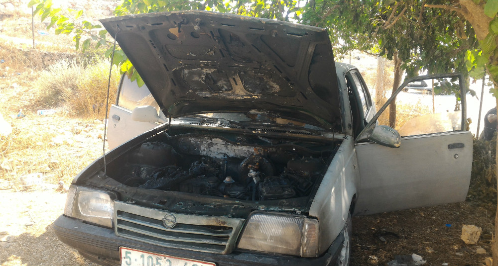 Wasim Bader’s Opel car, which was torched by settlers at Um Safa. Photography: Iyad Hadad, B’tselem . 9.8.17 Wasim Bader’s Opel car, which was torched by settlers at Um Safa. Photography: Iyad Hadad, B’tselem . 9.8.17