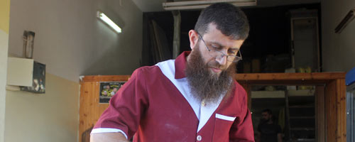 Khader &lsquo;Adnan at his bakery. Photo by Oren Ziv, activestills.org, 21 June 2013